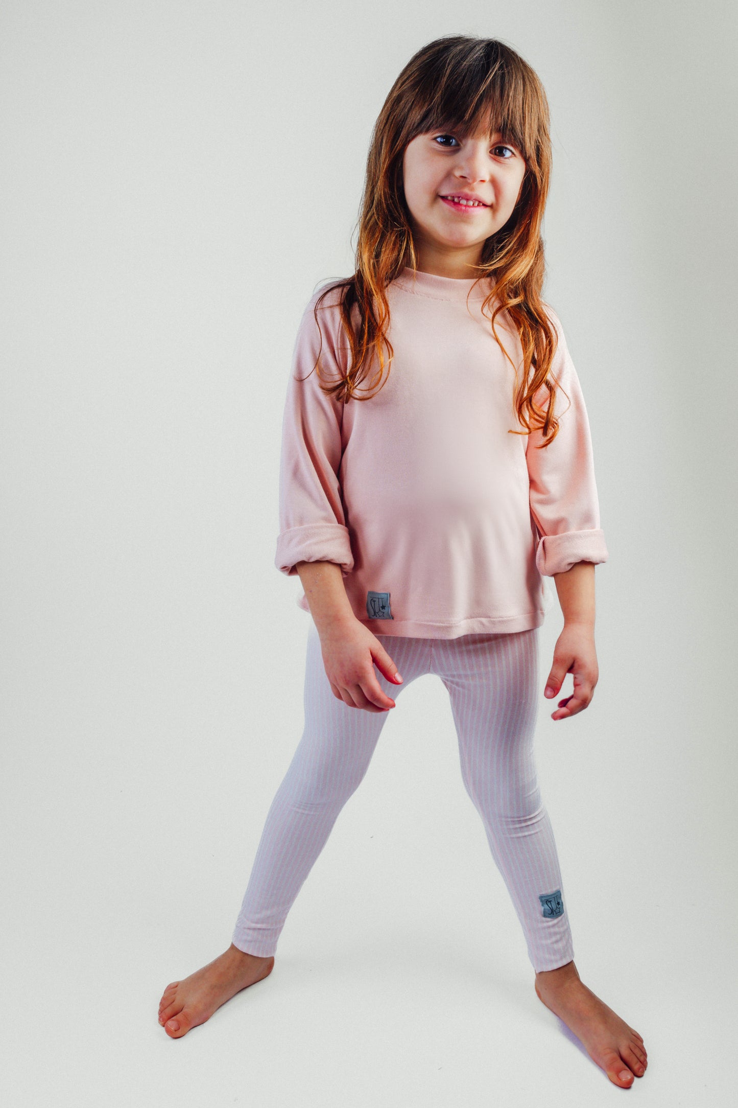 Felpa ROSA in cotone con rouches a righe.