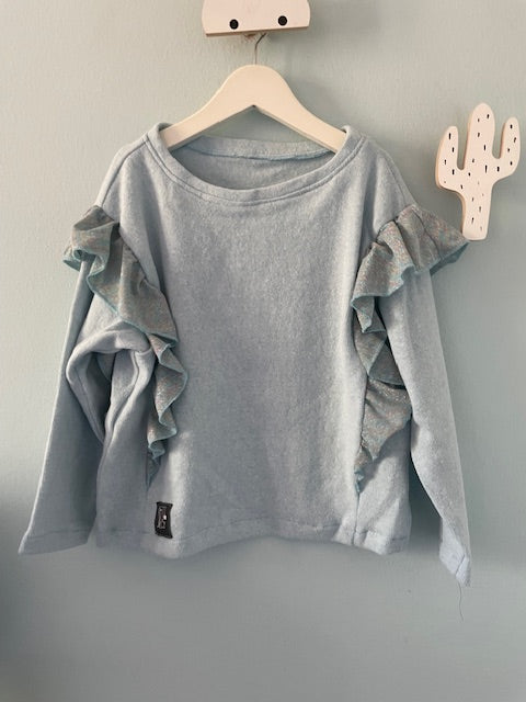 Felpa in caldo cotone azzurro con rouches glitter