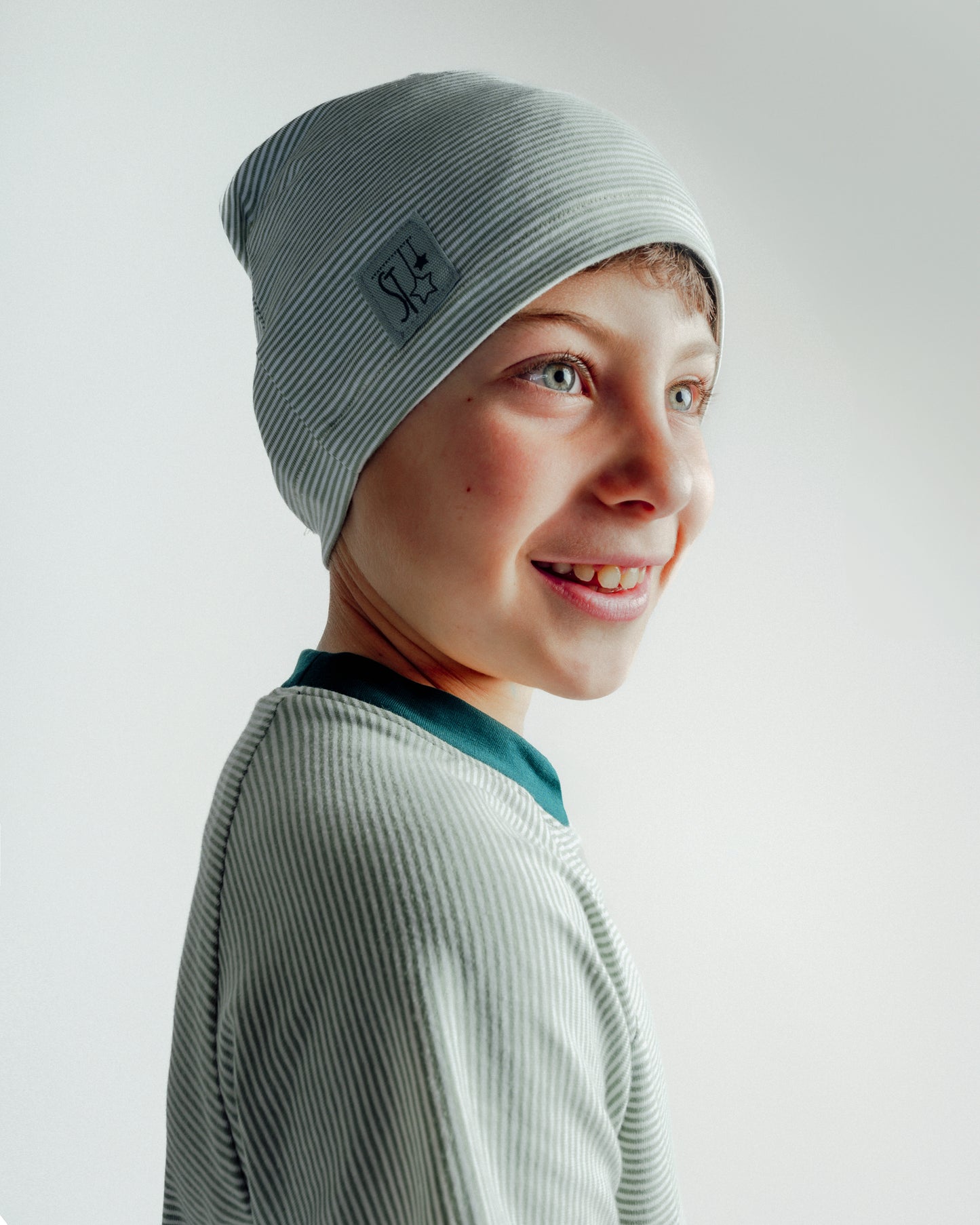 CAPPELLO IN COTONE A RIGHE VERDI